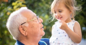 Grandpa and Granddaughter by Isaac Quesada